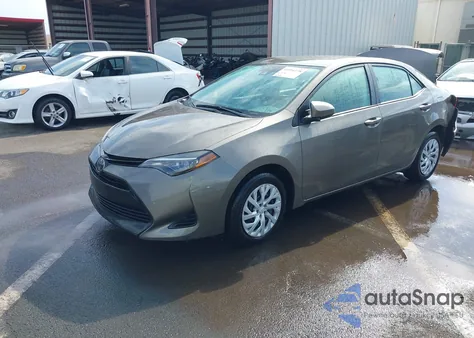 2018 Toyota Corolla Le from USA, damaged, VIN 5YFBURHE1JP763069